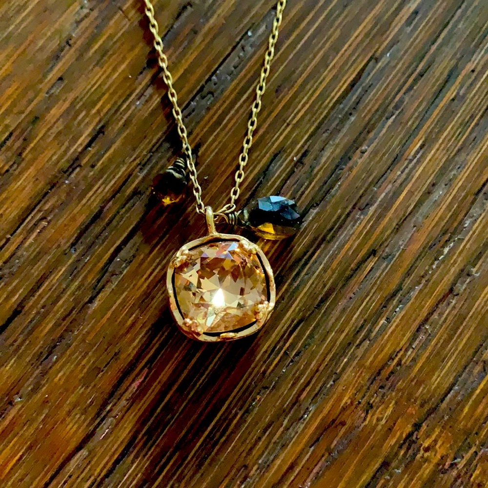Citrine colored pendant with amber beads/gold colored necklace